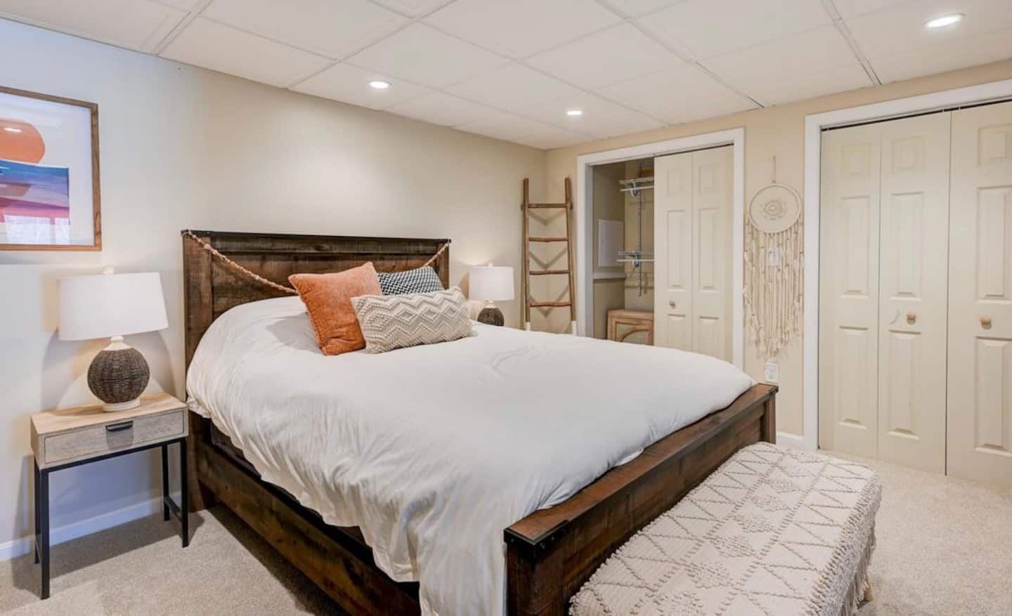Downstairs bedroom with extremely comfortable bed, large closet & washer/dryer.